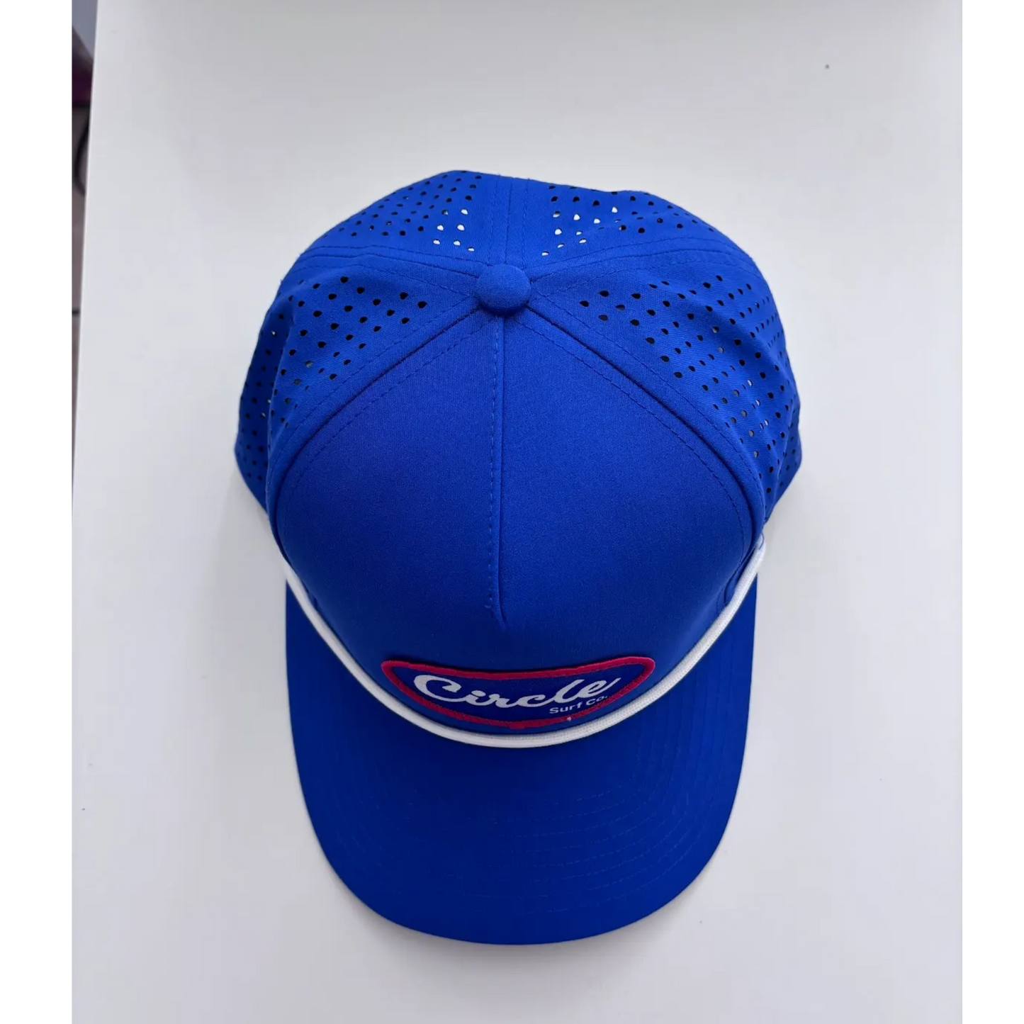 Mid tide perforated cap